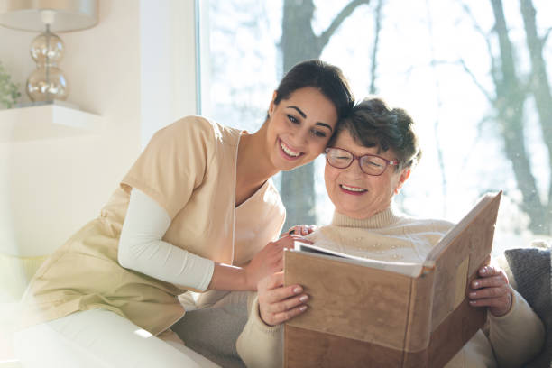 istock Geriatric patient with rehabilitation nurse 982985794