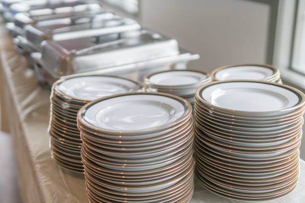 istock Plates and Chaffing Dishes set up for Nigerian Party Buffet 983018308