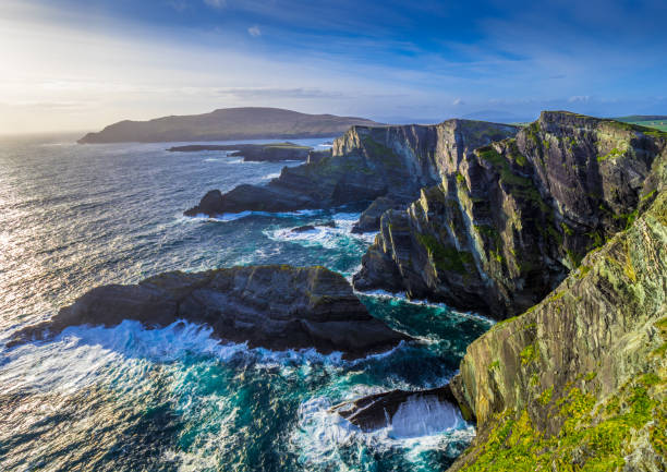 istock The Kerry Cliffs in Ireland - amazing sunset view 983027404