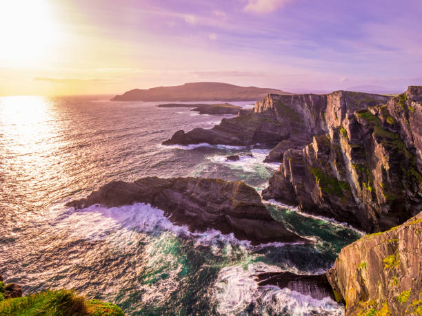 istock The Kerry Cliffs in Ireland - amazing sunset view 983027496