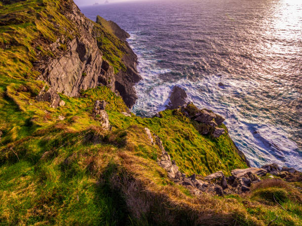 istock The Kerry Cliffs in Ireland - amazing sunset view 983031078