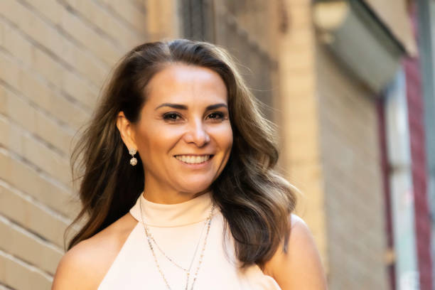 istock Smiling hispanic or middle eastern woman looking at the camera 983033754