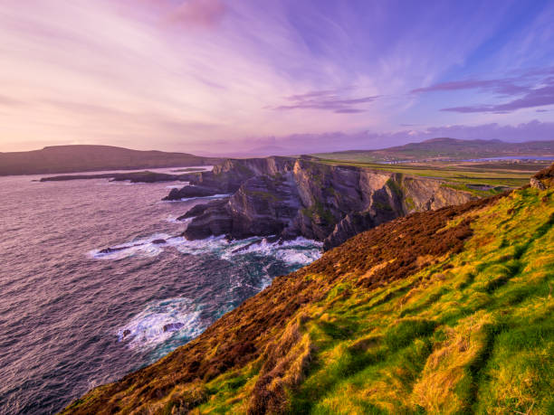istock The Kerry Cliffs in Ireland - amazing sunset view 983042184