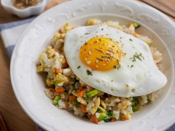 istock Asian food Vegetable egg fried rice 983058964