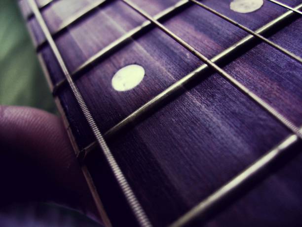istock Guitar Cords. Acoustic Guitar Neck. 983093484