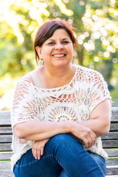 istock Smiling mature woman looking at the camera 983099176