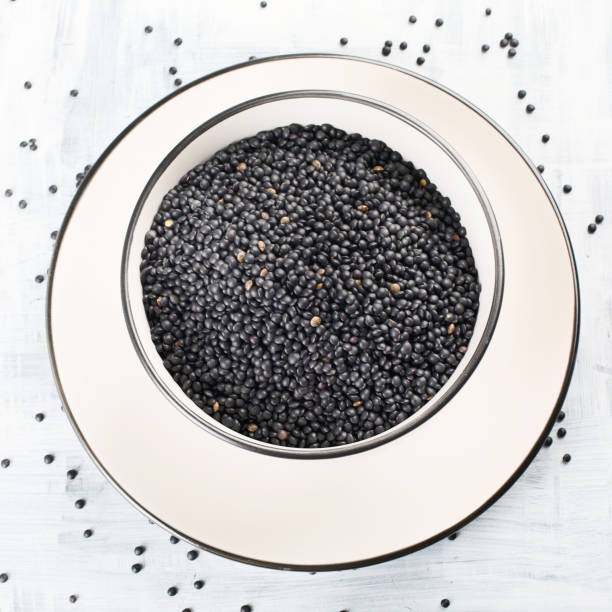istock Black beluga lentil seeds. 983102740