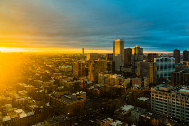 The scenic aerial view to the sunset over Jersey City, New Jersey The scenic aerial view to the sunset over Jersey City, New Jersey, USA jersey city stock pictures, royalty-free photos & images