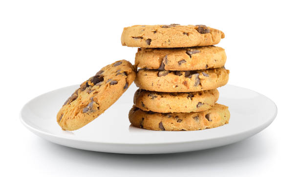 istock Chocolate chip cookie in a plate isolated on a white background 983109310