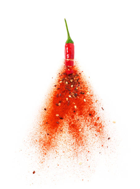 istock Chili powder burst from red chili pepper 983114956