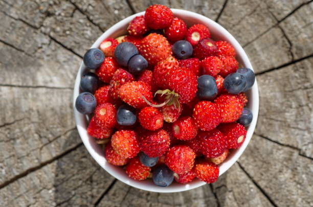 istock Bowl with strawberries and blueberries close-up 983120460