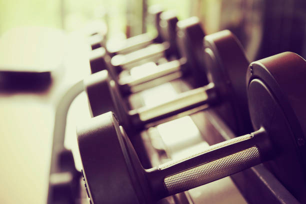 istock Black steel dumbbell set. 983123266