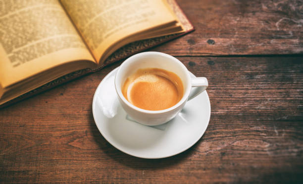 istock Old books and a cup of coffee 983126868