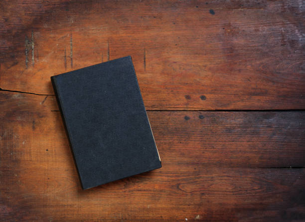 Old book on wooden background