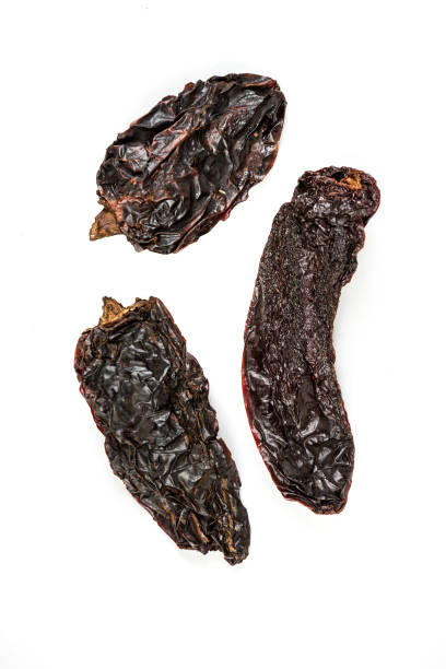 istock Dehydrated morita chilis isolated on a white background 983126956