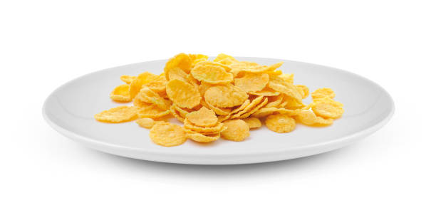 istock tasty cornflakes in plate isolated on white background 983127462