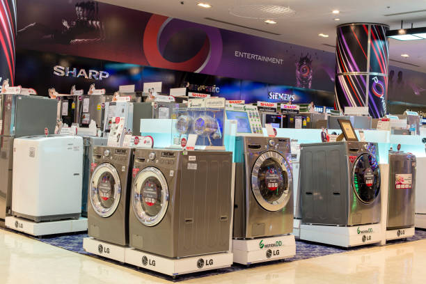 Sale of washing machines in the supermarket of various manufacturers in Siam Paragon Mall, Bangkok, Thailand stock photo