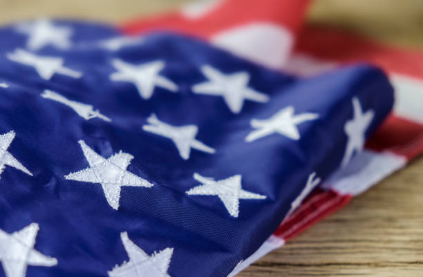 istock American flag on wood background 983130276