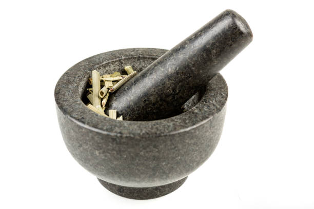 istock Dehydrated horsetail plant in a bowl isolated on a white background 983131172