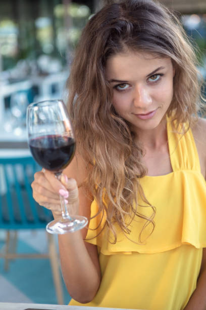 Woman with red wine
