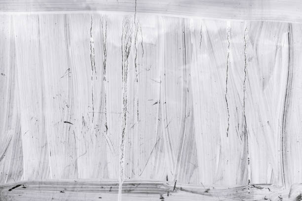 istock hand painted white glass surface of greenhouse window 983147228