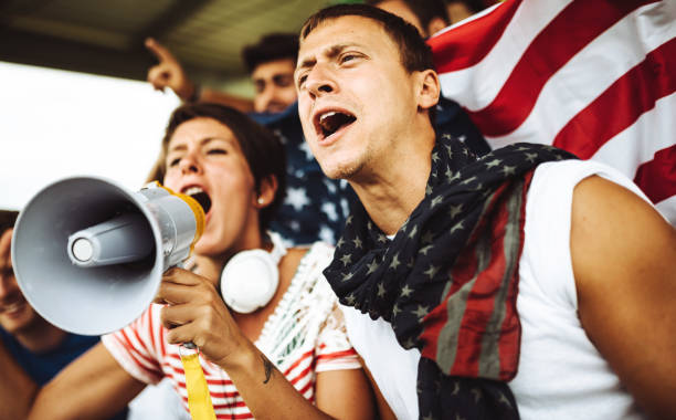 istock american supporter with flag 983188164