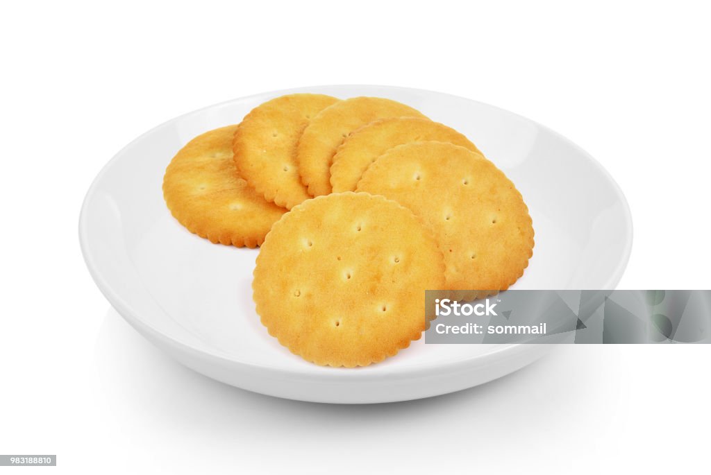 Cracker in plate on white background Appetizer Stock Photo