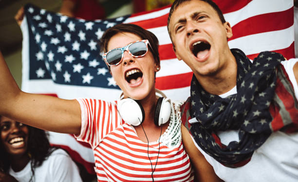 istock american supporter with flag 983189006