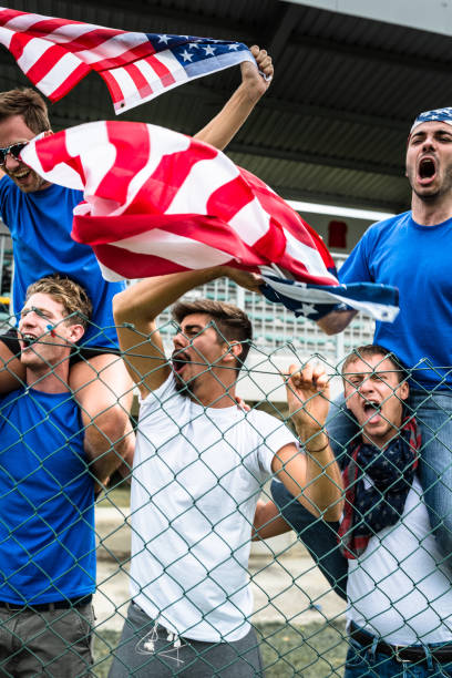 istock american supporter with flag 983191860