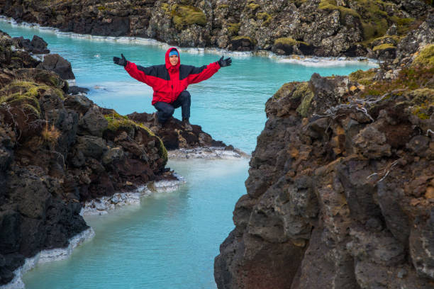 istock Thermal river and happy tourist 983192662