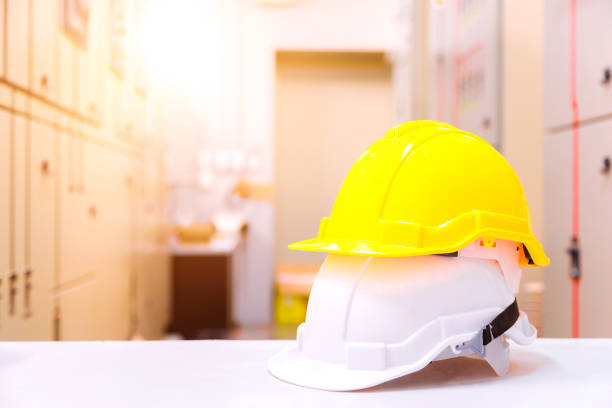 istock Standard construction safety equipment in control room, Construction and Safety Concept. 983196624