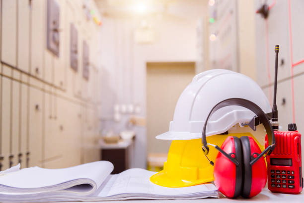 istock Standard construction safety equipment in control room, Construction and Safety Concept. 983197002