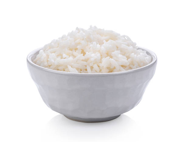 istock jasmine Rice in a bowl on white background 983203284