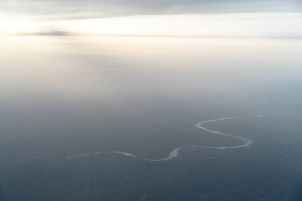 istock river seen from airplane flying in the air 983204368