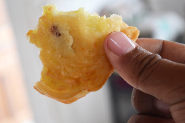 istock Hold a homemade apple donut 983215788
