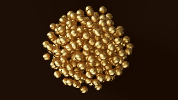 istock Gold Footballs Formed into a Sphere 983218780