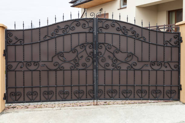 istock New forged metal double gates 983223748