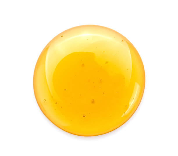 istock Sweet honey isolated on white background. 983228484