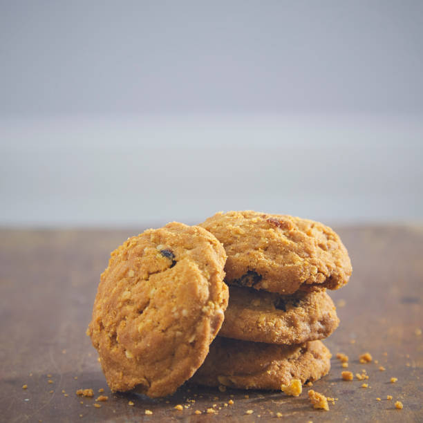istock chocolate chip cookies on wood table 983235570