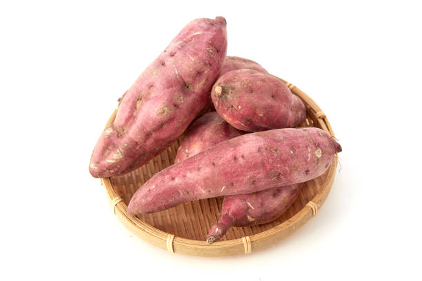 istock sweet potato on the white background 983235640