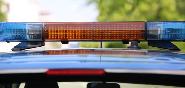 istock car police with sirens 983236442