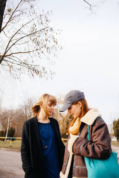 istock Two young women near lake 983236968