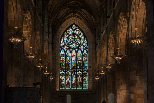 Paris, France: A stained glass window inside the Church of Saint-Eustache, a Gothic structure completed in 1637 and located in the 1st arrondissement. The window has a date of 1843 on it.