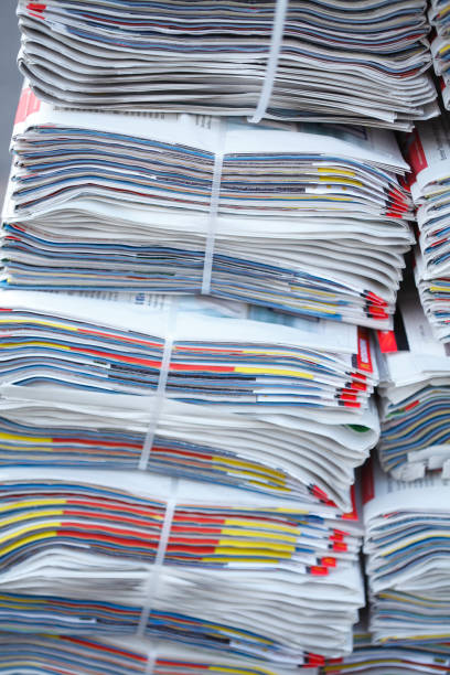 istock stacked daily newspapers, background, texture 983267400