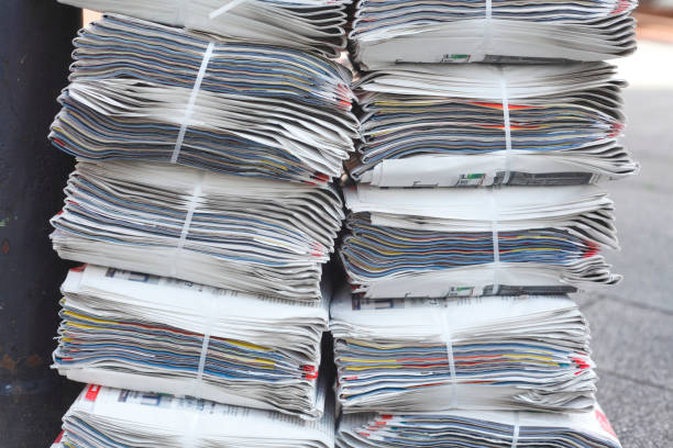 istock stacked daily newspapers, background, texture 983268020
