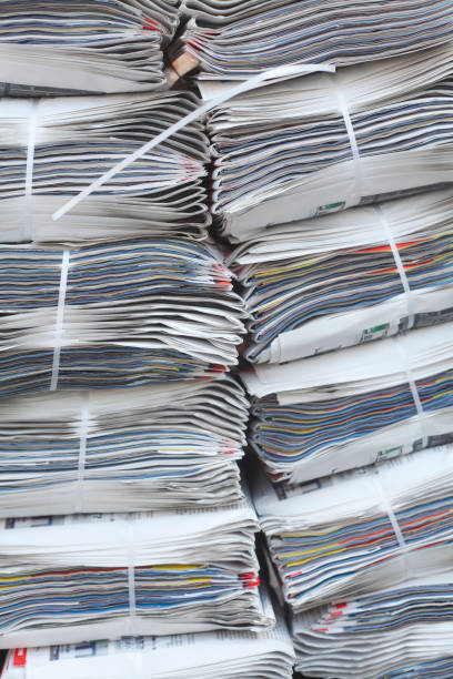 istock stacked daily newspapers, background, texture 983268118