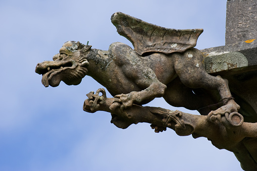 Winged dragon gargoyle on Scottish castle