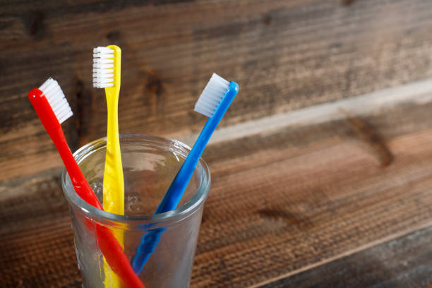 istock Wooden table and toothbrush 983276526