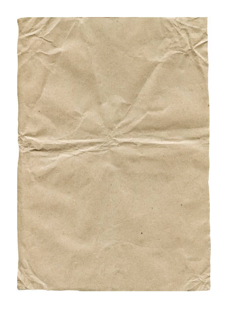 istock Old crumpled paper isolated on white background 983281998