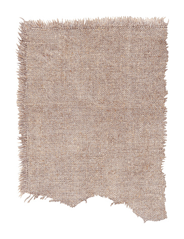 Burlap fabric torn Sack cloth isolated. Texture sack background. Burlap hessian sack material isolated on a white